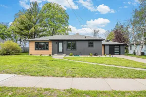 Image of Manistee Channel Waterfront Home with Boat Dock