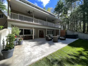 Image of New! Luxury Lakefront Lodge - Pier, Beach, Boats, Hot Tub, Fire pits, Fireplaces