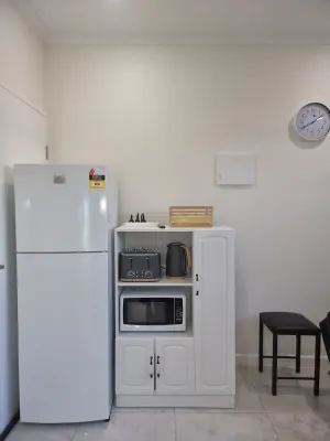 Image of 3km from CBD. One-year-old, modern, self-contained unit with a homely touch.