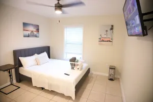 Image of Beachy Oasis Queen Bedroom with Shared Lavatory