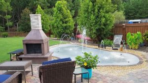 Image of Spacious suite with fenced back yard, deck, gas grill, fireplaces and splash pad