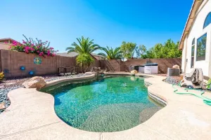 Image of Cozy house near I-10 with pool heater, hot tub, BBQ