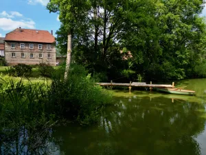 Image of Quiet vacation apartment with wood-burning stove, sauna, garden & terrace on historic estate. Castle courtyard