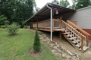 Image of Cozy Tennessee Plateau home. Furnished outdoor living with 1G Wi-Fi