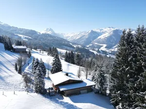 Image of romantic mountain hut in the Kitzbühel Alps for skiing and hiking holidays.