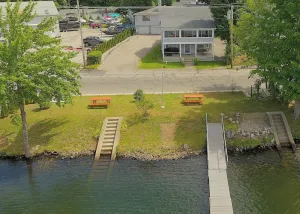 Image of The Inn at Highland Lake, 2nd Floor, waterfront yard with a boat dock