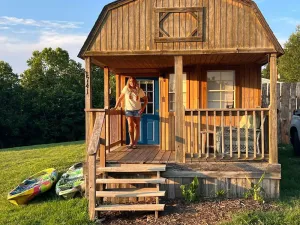 Image of The Little Sugar Shack, a rustic tiny cabin with hot tub access & fiery sunsets!