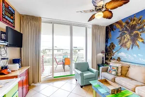 Image of Vibrant Tropical Beach Getaway Including 2 Chairs and Umbrella