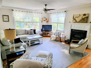 Image of Renovated 3Br\/2Ba Home! Screen Porch! Lagoon Views! Only Lake House Amenity Cards available.