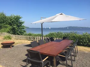 Image of Bauhaus house on spacious grounds with a private water access