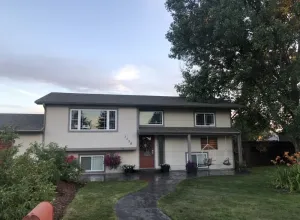 Image of House Near Hospital, Baseball Fields, and College