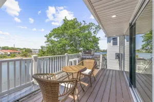Image of Waterfront Firepit Game Room at Legacy Beach House