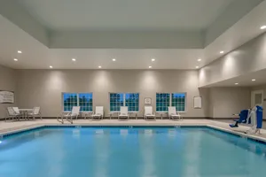 Image of King Suite. Free Breakfast. Pool. Gym. Near Rock Creek Country Club!
