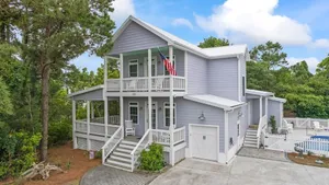Image of Classic oceanside home offering private pool and easy beach access.