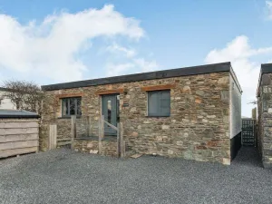 Image of A luxury getaway for couples, with private hot tub, free standing bath and beautiful views.