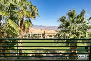 Image of Perfectly refined home w\/ large balcony, overlooking lake and palms..