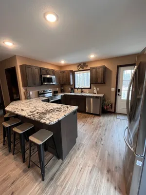 Image of Cozy two level home - 2 minutes from beach on private wooded lot.