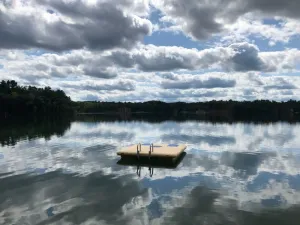 Image of Crystal clear lake with a  private beach and gorgeous views