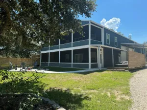 Image of Studio style top floor apartment on the Mermentau River with pool and river view