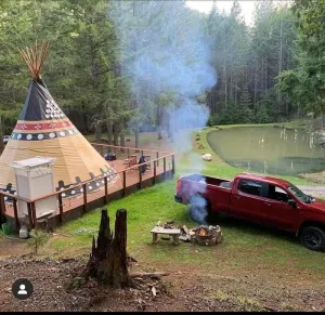Image of 22 Foot Ceremonial Luxury Tipi with pond view