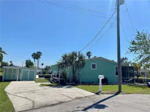 Image of Fully remodeled, adorable coastal canal house on a spacious corner lot.
