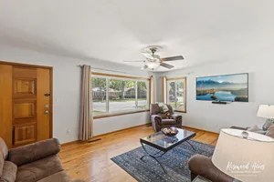 Image of King Bed with fenced in backyard & Large 65\" TV