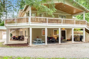 Image of Dog-friendly ground-floor home with spacious patio, gas firepit, grill & WiFi