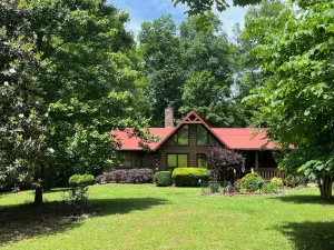 Image of River front log home 3 miles from Tryon Equestrian Center, gated community