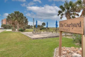 Image of A Cozy Getaway Near the Beach, Poolside Condo
