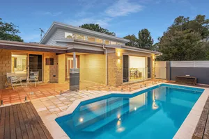 Image of GORGEOUS CONTEMPORY ESCAPE SHOWCASING LUSH GARDENS AND LUXE SPARKLING POOL