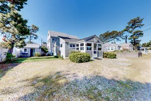 Image of Charming cottage with private W\/D, wifi + minutes to beach
