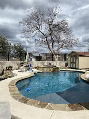 Image of Cheerful oasis home with pool and hot tub. 2.5 miles from downtown.