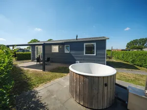 Image of Treat yourself to a holiday home with a private hot tub.