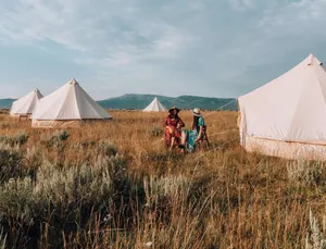 Image of Twin Tent w\/ Shared Bathroom - Step into our open field between the mountains.