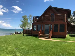 Image of Straits of Mackinaw log Cabin. Spectacular views of Mackinac Island! Kayaks incl
