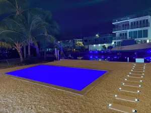 Image of One story home with a pool on the water in Key Largo