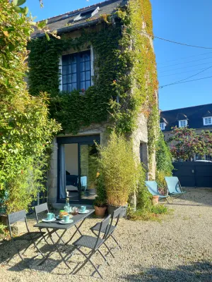 Image of Stone house. 4 bedrooms, 5 beds, 2 bathrooms. Village center, beach 150 m away. Enclosed garden
