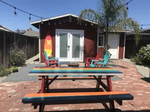 Image of .5 mi to Beach, trails or Main Street ! Hot tub and fire pit!