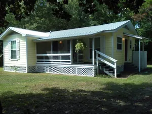 Image of Cute,Peaceful, Private little cottage. Fenced Yard, Pets and People Friendly!!