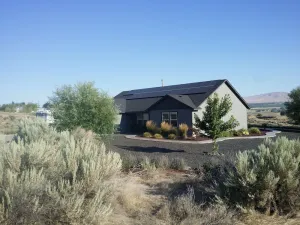 Image of Wine tasting from this eco-friendly home with stunning views.