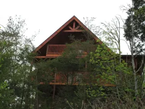 Image of Book your summer getaway in this 5 bed 4 bath cabin with stellar smoky views