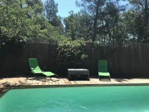 Image of T2 in private property in garden with pool overlooking pinewood