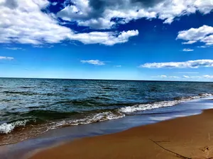 Image of Coastal Breeze · Beachy, Updated Home · Steps to Sandy Lake Huron & Downtown