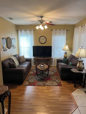 Image of A beautiful home clean and ready to receive guests, in a cozy ambient setting.