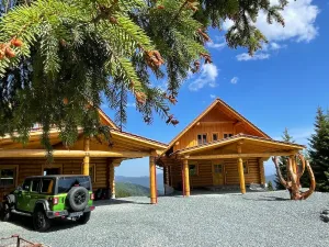 Image of Living above the clouds in a log cabin