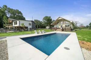Image of Charming Lakefront Home with Spacious Yard & Porch