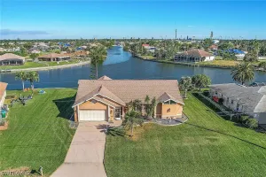 Image of Waterfront Canal with Paddle boarding, kayaking, and fishing