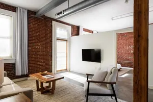 Image of Spacious DT 2BR with Full Kitchen by Zencity