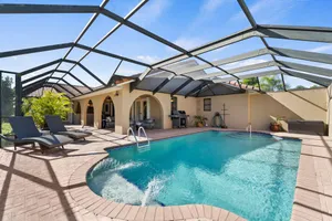 Image of Dog-Friendly Canal-Front Home with Heated Pool, Dock, Screened Lanai & Free WiFi