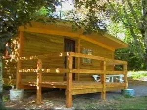 Image of chalet by the lake, with large terrace